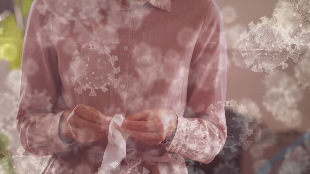 코로나 19 세포의 애니메이션이 마스크를  ⁇ 는 사람 위에