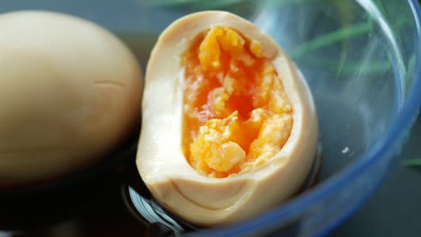 close up of half eaten bowel egg in a bowl ,