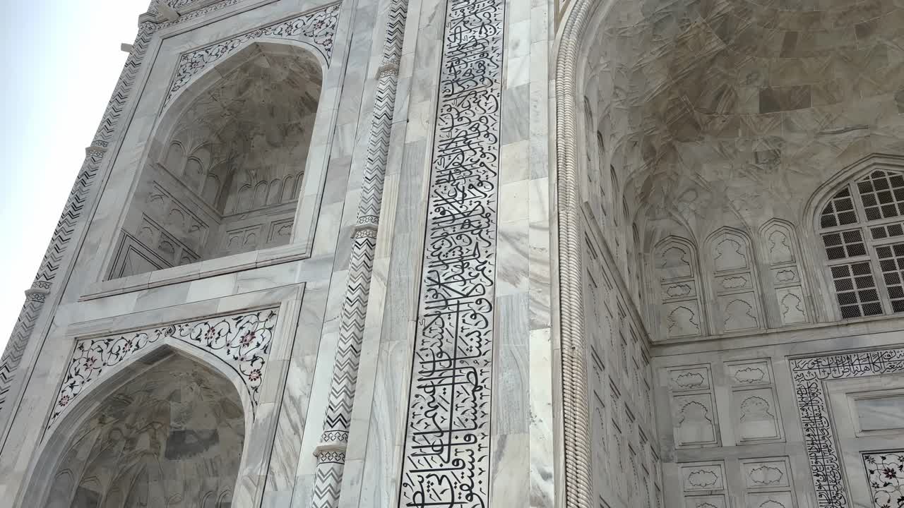 Ivory-white Marble Mausoleum Of The Taj Mahal In Agra, Uttar Pradesh, India. Tilt-up Shot