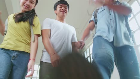 violent asian students at high school bullying at the camera