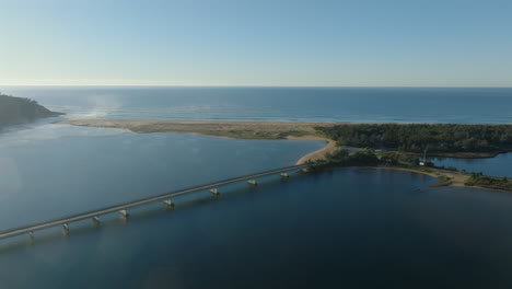 drone shot of a large bridge over the bega river near tathra on south coast nsw, australia