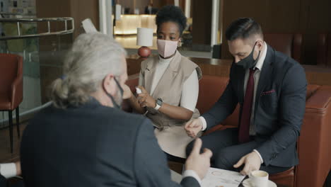 business meeting in hotel lobby