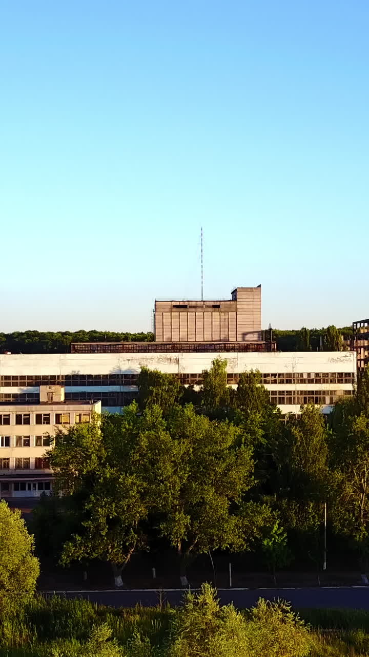 Abandoned Factory Building. View of an old abandoned factory building Vertical video
