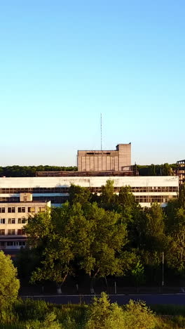 abandoned factory building. view of an old abandoned factory building vertical video