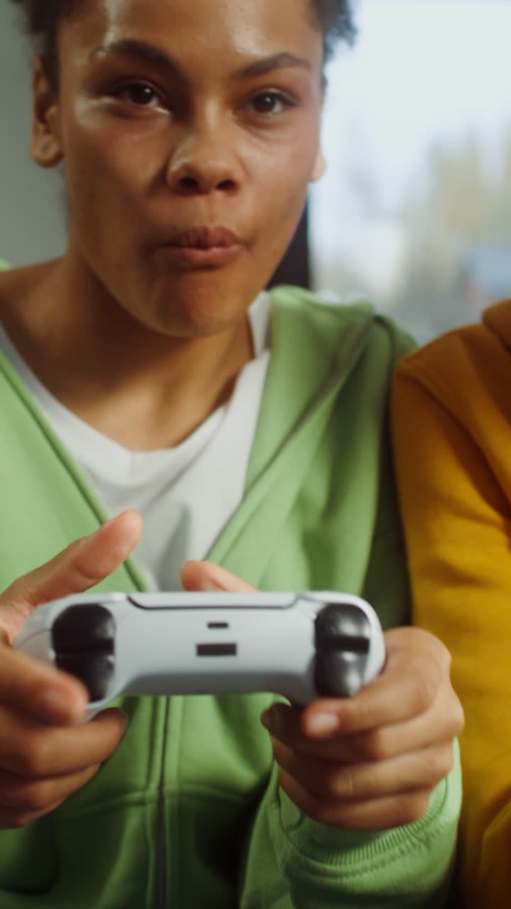 Teenagers playing video games