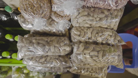 medium shot, peanut shells for sale, ecuador