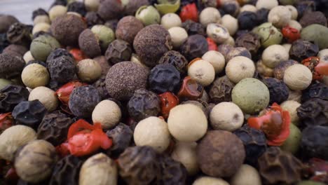 macro close-up mixed peppercorns. dry mix peppercorns close up