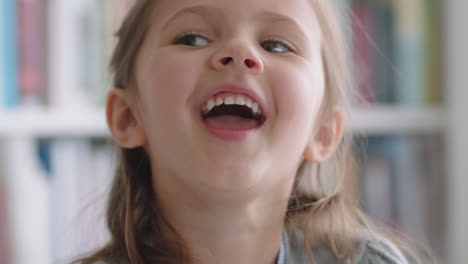 portrait beautiful little girl smiling with natural childhood curiosity looking joyful child with innocent playful expression 4k footage