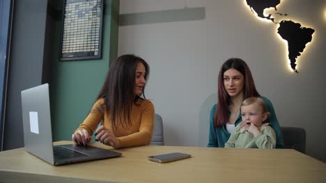 the family chooses a vacation ticket from a travel agency. travel concept