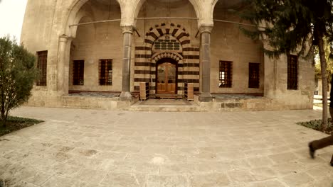 enter in mosque of halil-ur-rahman young muslim guy goes through urfa