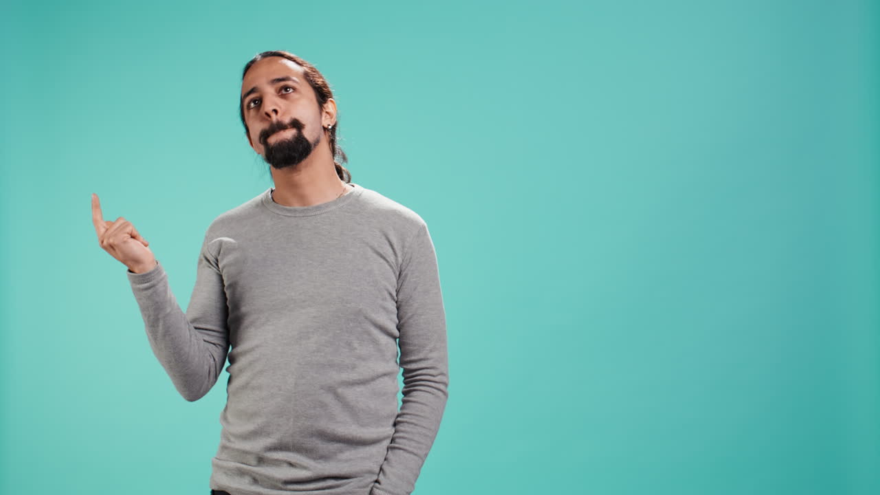 Portrait of man acting casually, exuding nonchalant and carefree demeanor
