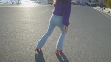 woman roller skating outdoors on a sunny day