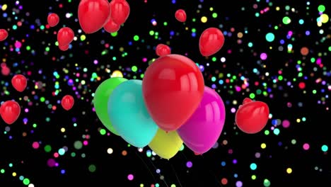 animación de globos y luces de colores volando sobre un fondo negro