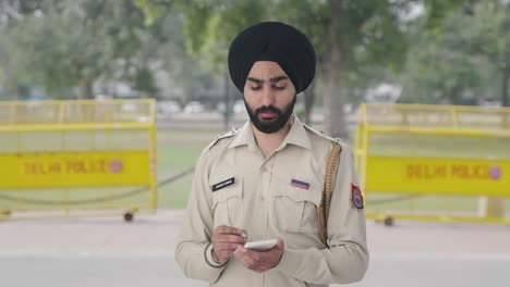 sikh indian police man writing fir