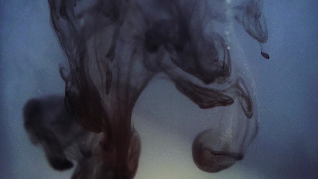 Paint floating in water looking like majestic nebulas. Stable shot with the Sony a7iii.