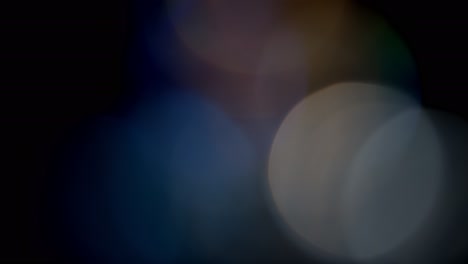 multicolored light leaks footage on black background, lens flare leak burst overlays transitions