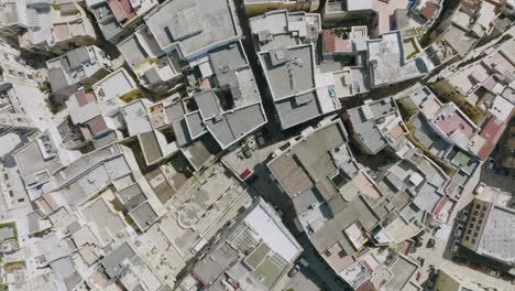 Top-down-aerial-flyover-of-Old-Town-Bari-showing-the-tight-street-layout-and-squeeze-of-buildings