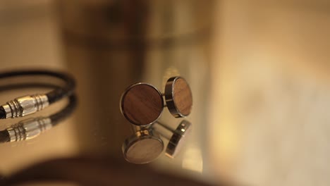 elegant wooden cufflinks and leather bracelet