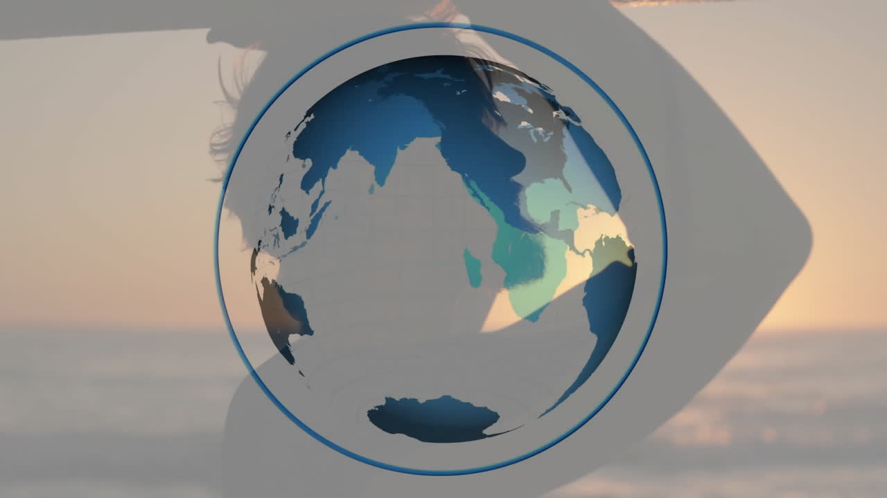 person wearing wide sun hat exploring digital globe overlay travel technology over beach sunset