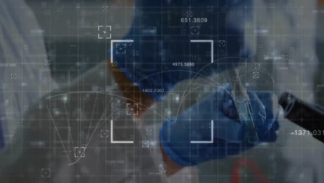 Animation-of-dna-structure-and-scope-against-mid-section-of-male-scientist-working-at-laboratory