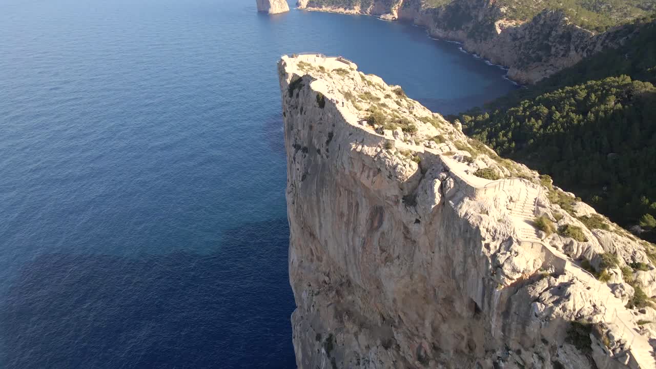 Experience breathtaking panoramic views from Mirador es Colomer, overlooking the rugged cliffs of Cap Formentor and the serene Mediterranean Sea. Ideal for nature lovers and adventurers.