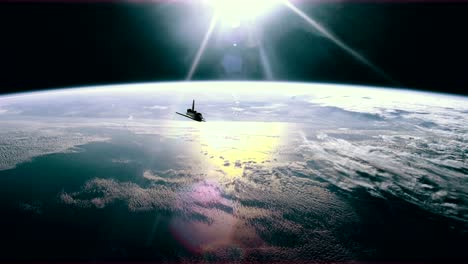 el transbordador espacial en órbita sobre la tierra.