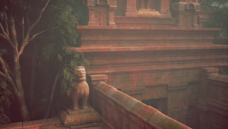 ruinas de templos antiguos con una estatua de león de piedra