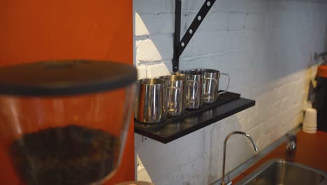 modern coffee shop kitchen with coffee beans and equipment