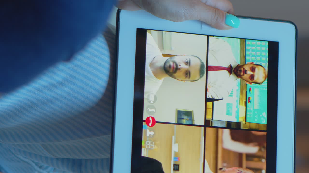 Vertical Video: Woman Listening Online Training On Tablet