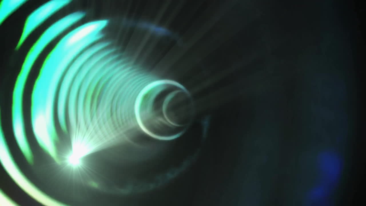 Animation of colourful light trails and circles moving on black background