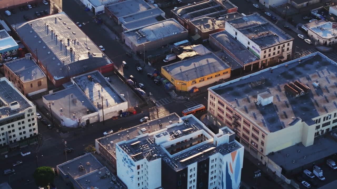 Aerial View of Urban Cityscape with Buildings and Street Encampments