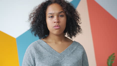 teenage girl with a serious expression