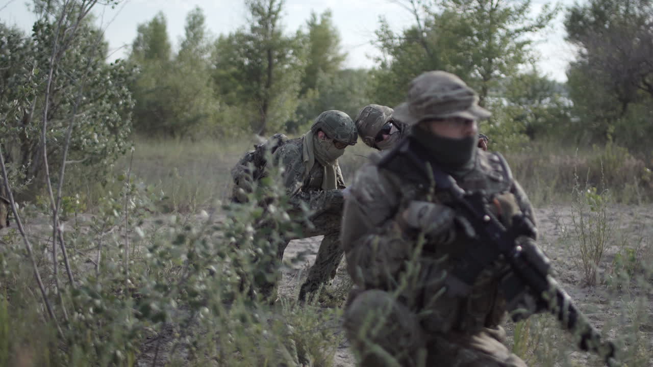 Soldiers in Camouflage Uniform During Military Exercise