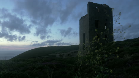 evening landscape view looking up at cornish mine engine house