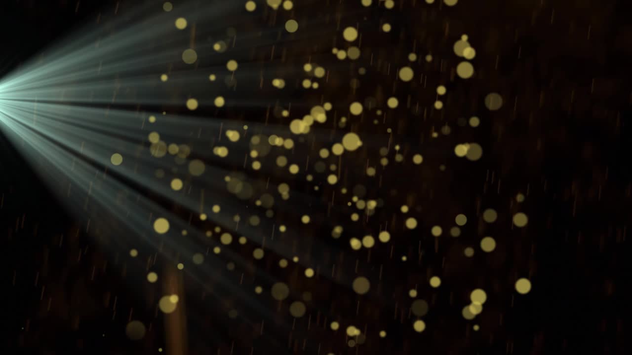 Narrow white light beam initiating golden disks forming drifting and twirling creating depth effect