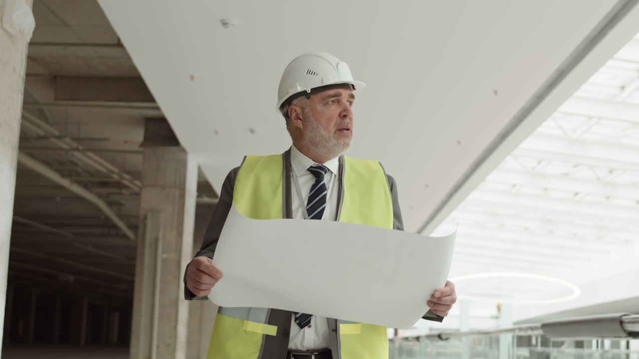 Caucasian Man Supervising Mall Under Construction
