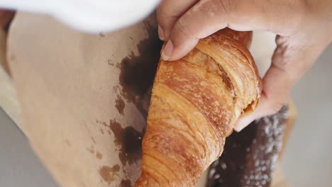 croissant on brown paper