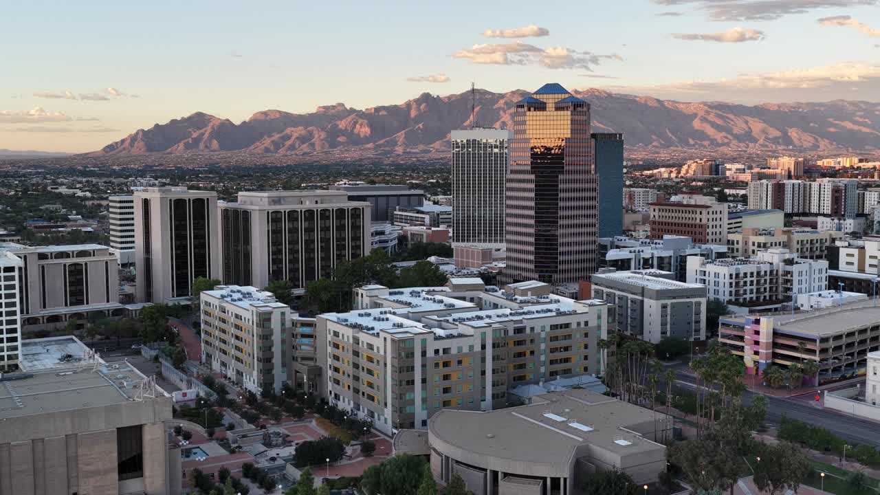 Ascending Drone View of Downtown Tucson, Arizona Close to Sunset with Catalina Mountains in Background