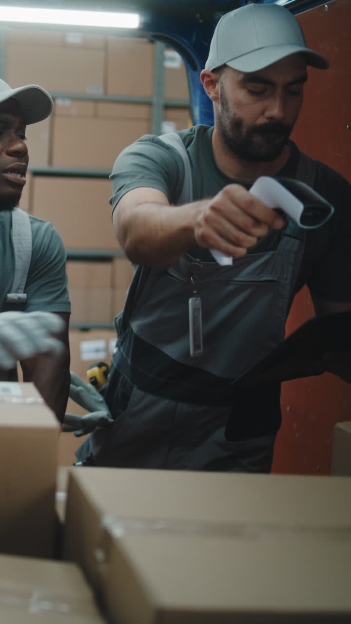 Warehouse Workers Scanning Boxes and Managing Inventory
