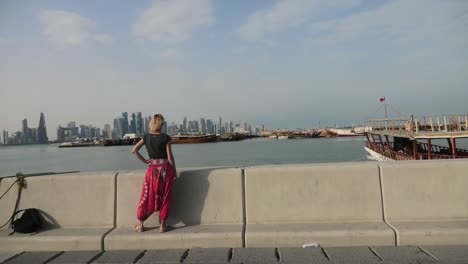 tourist woman at doha corniche