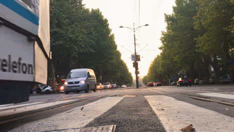 low shot of tram in belgrade in sunset, city center