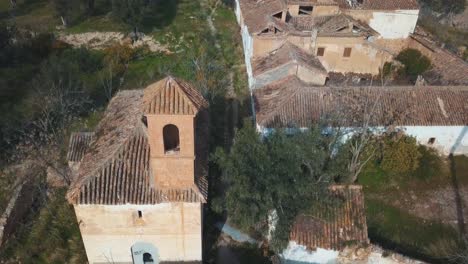 aerial view of an abandoned village with a church in spain