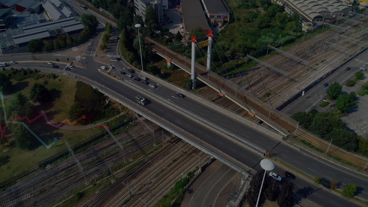 Busy highway intersecting railway tracks in urban area, animation of city traffic