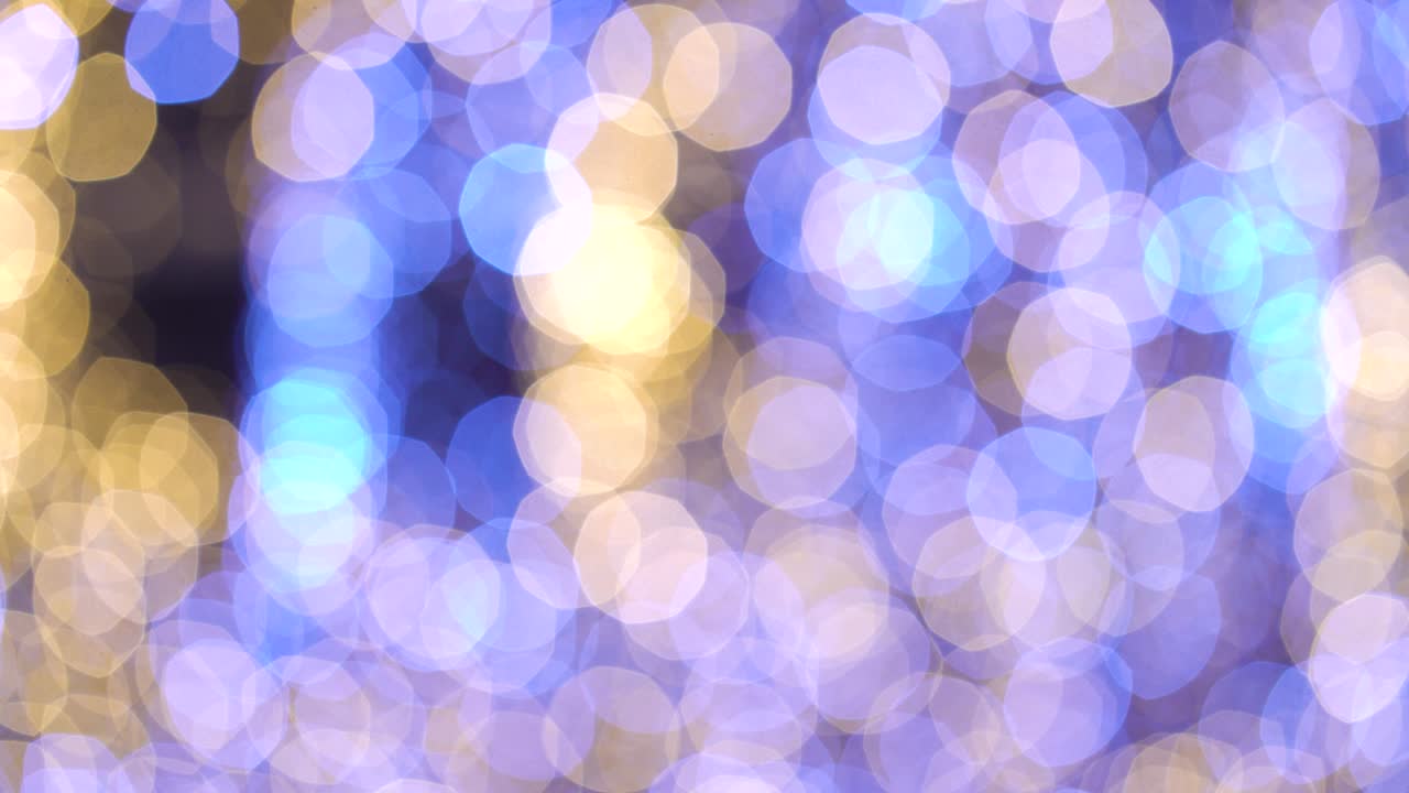 Bokeh background with stirring blue and yellow lights