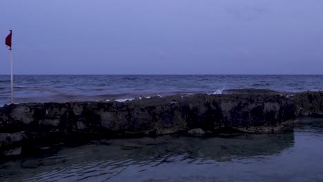 the rocky shore of a beach in mexico