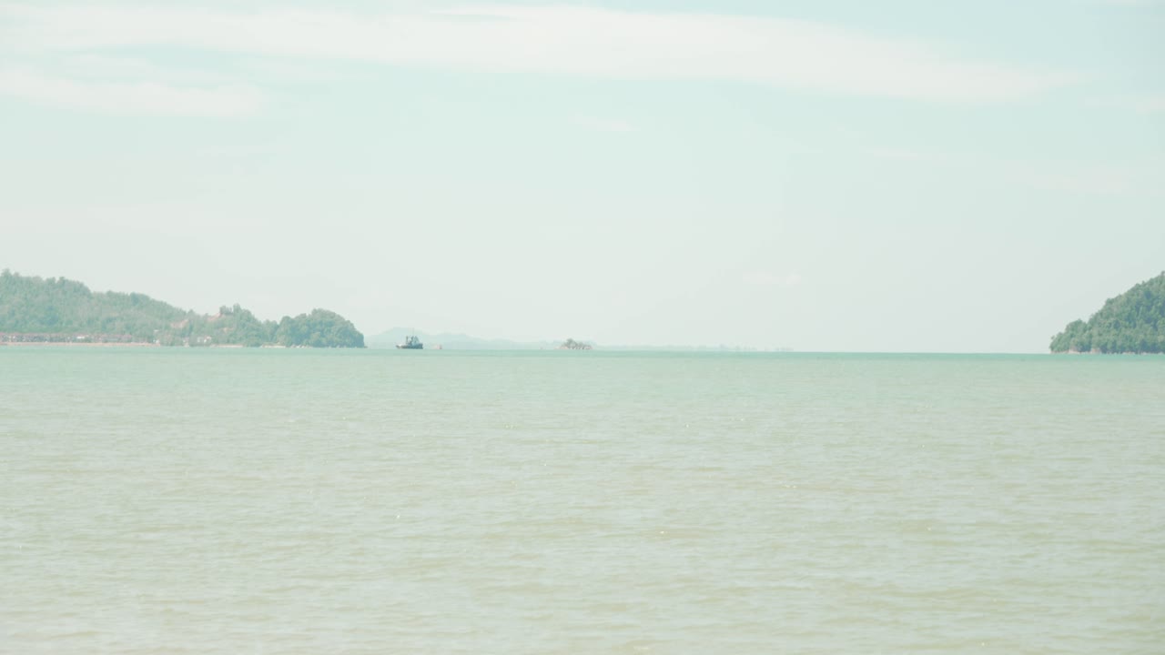 Lok Kawi Beach The Beach Sits Near Residentail Zone,With Its Shoreline Sea,Beds,Good For Casual Beach Time,During Sunset,With White Sandy Beach,Blue Sea Facing Few Island To The South China Sea