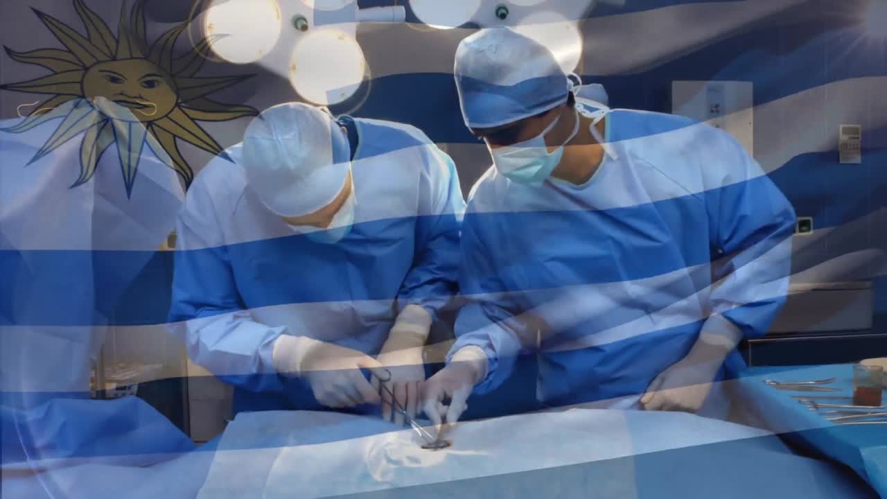 수술실 에 있는 외과 의사 들 위 에 우루과이 의  ⁇ 발 이 흔들리는 애니메이션