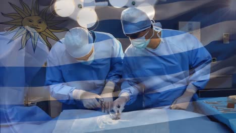 animación de la bandera de uruguay ondeando sobre los cirujanos en la sala de operaciones