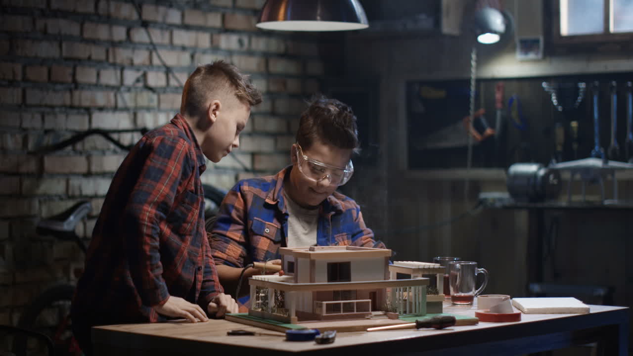 Boys Building a Model House in a Workshop