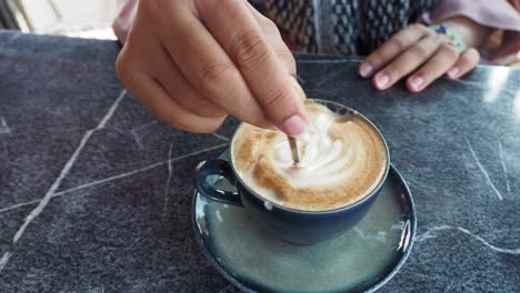 person making latte art